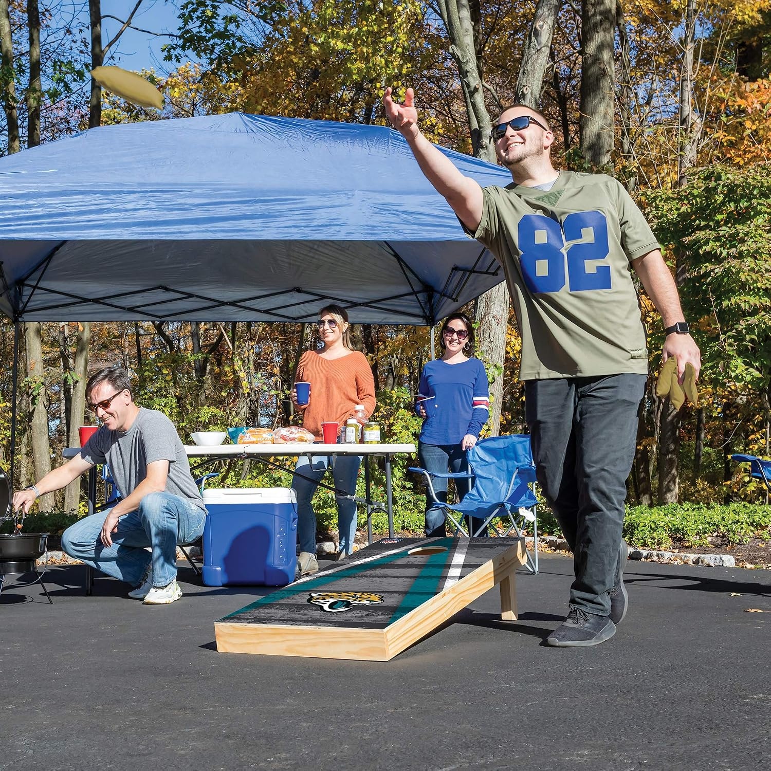 NFL Pro Football 2′ x 4′ Wood Direct Print Tournament Cornhole Set by Wild Sports, Comes with 8 Bean Bags – Perfect for Tailgate, Outdoor, Backyard(Jacksonville Jaguars)