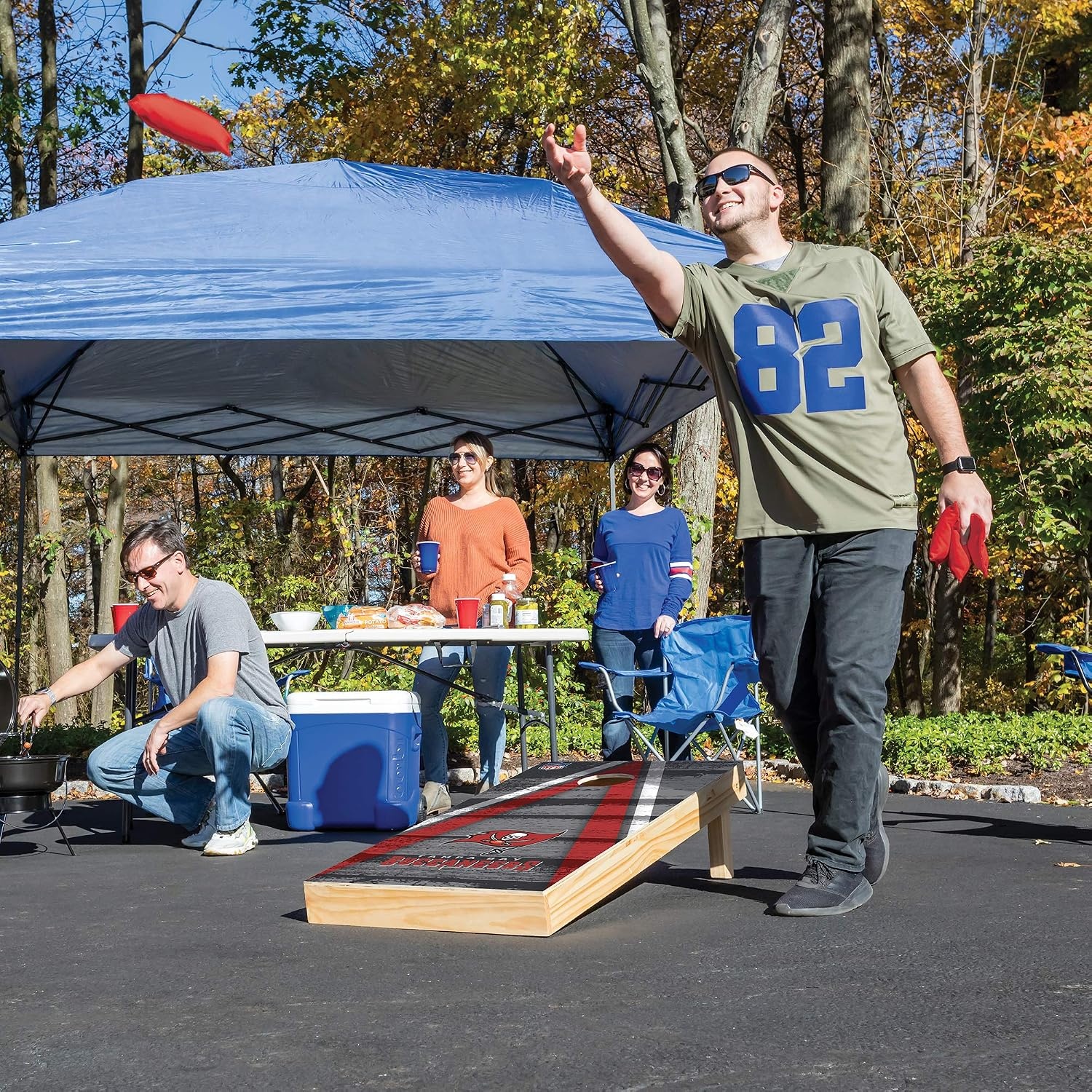 NFL Pro Football 2′ x 4′ Wood Direct Print Tournament Cornhole Set by Wild Sports, Comes with 8 Bean Bags – Perfect for Tailgate, Outdoor, Backyard(Tampa Bay Buccaneers)